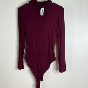 Charlotte Russe burgundy, bodysuit brand new size medium